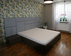 Кровать с подъёмным механизмом и тумбами. Корпус: ДСП Egger, спинка: эко-кожа.