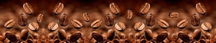 Скинали. Падающие кофейные зёрна на коричневом фоне.
